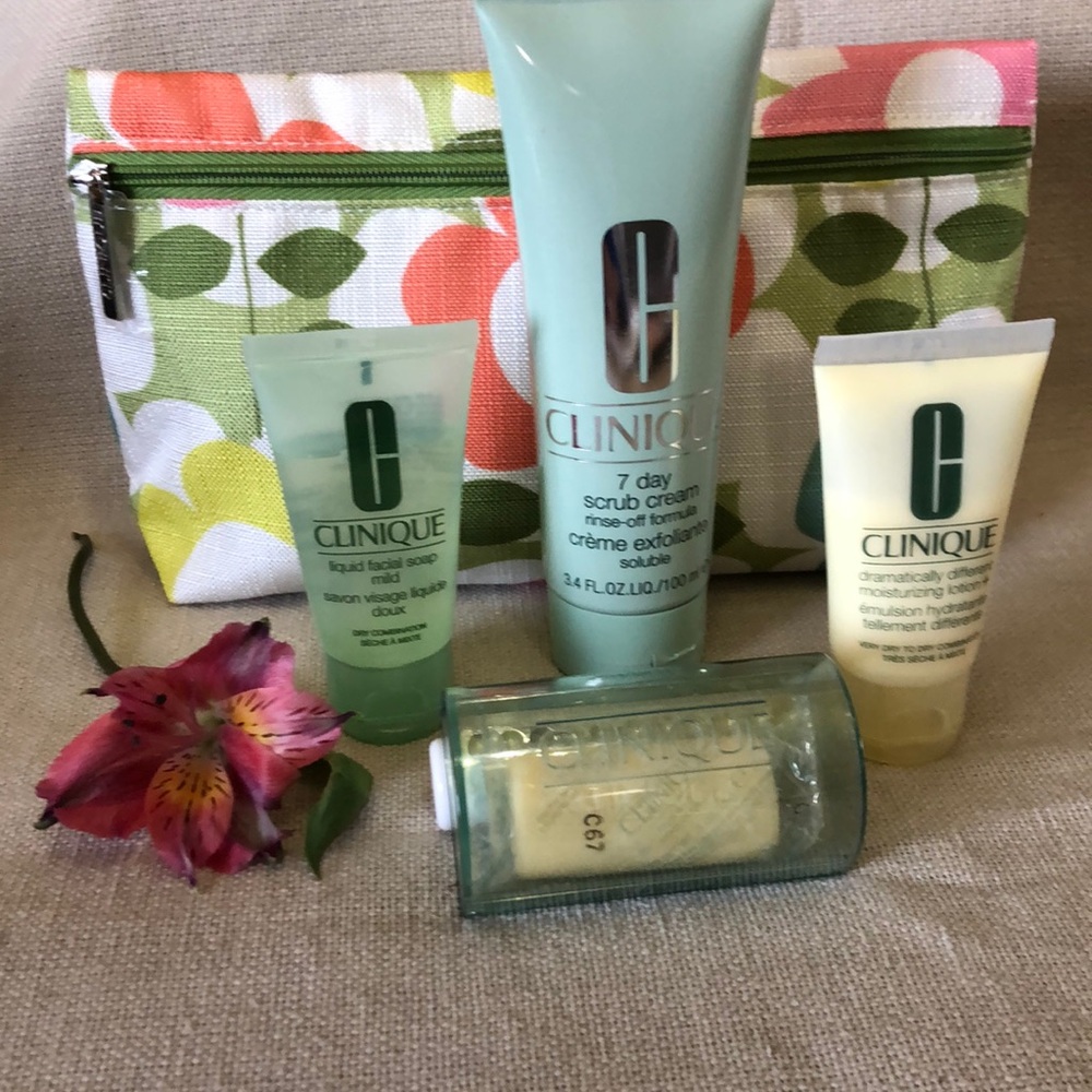Brand new! Home and travel Clinique cleansing kit 5 pc set incl cosmetic bag.